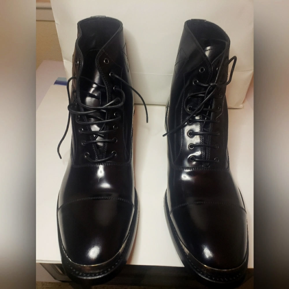 Alexander McQueen silver tipped lace up boots.